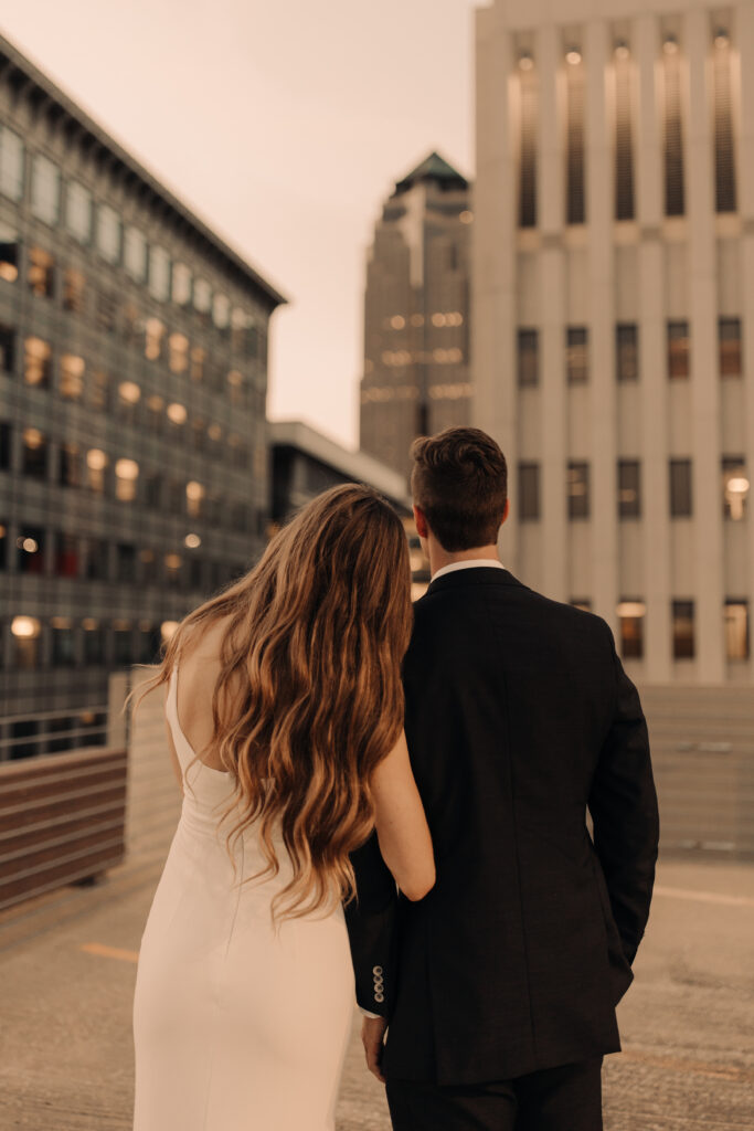 city engagement session in a sleek white dress