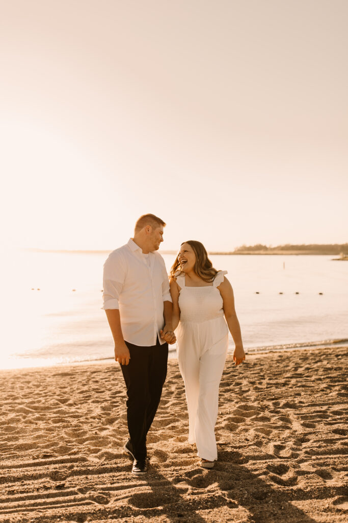 beach engagement photos wearing all white
